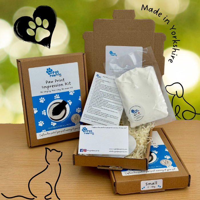 Three paw print kits, One open showing contents of board, putty and instruction card. Made in Yorkshire
