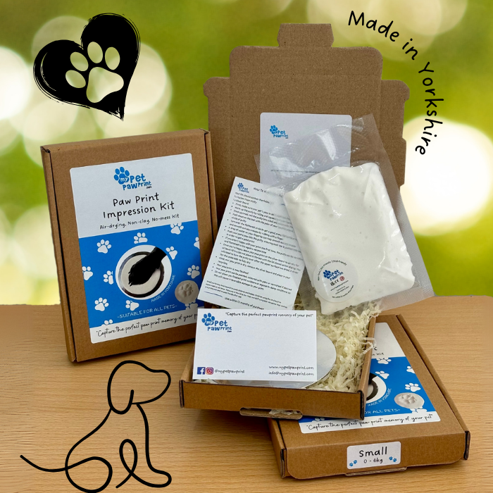 Three paw print kits, One open showing contents of board, putty and instruction card. Made in Yorkshire